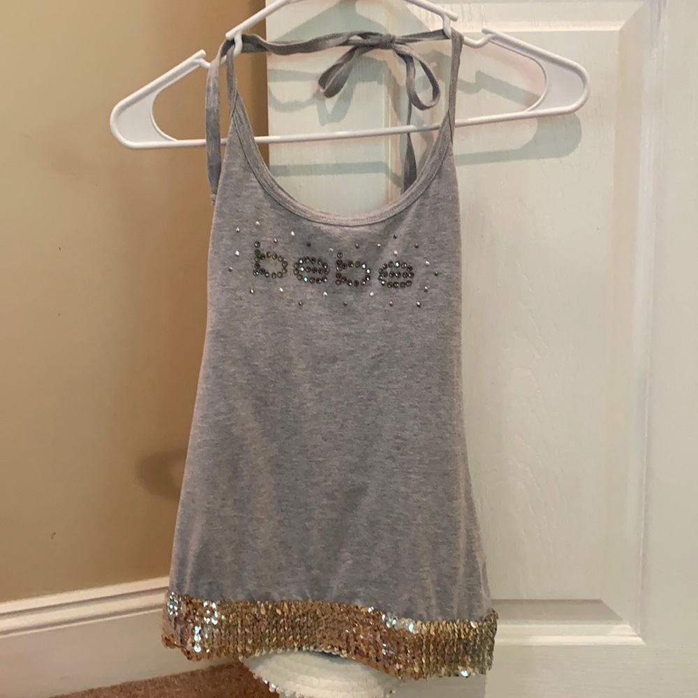 Used Bebe tube style top with sequins